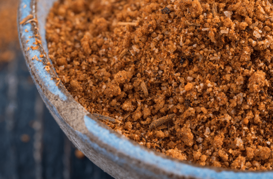 black background, blue bowl, filled with bbq rub