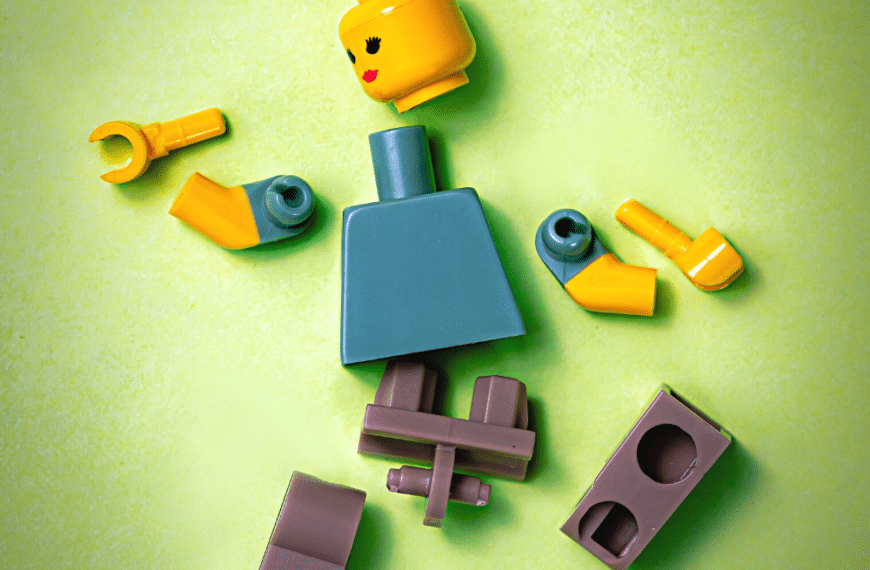 overwhelmed broken legos on green background