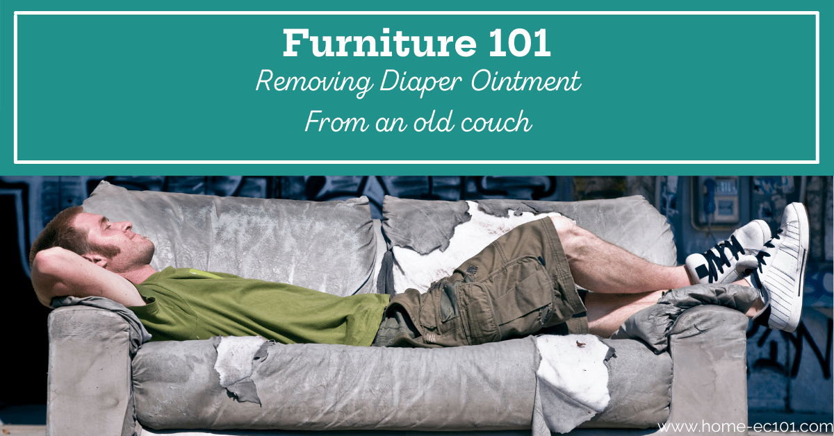 Young man lounging on a grungy couch